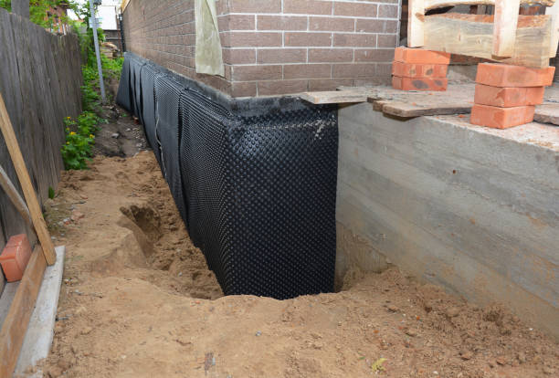 Happy homeowners after waterproofing job in Demarest